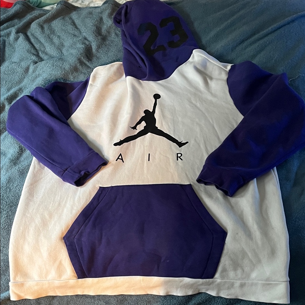 Authentic Air Jordan Purple and white hoodie with 23 on the hood